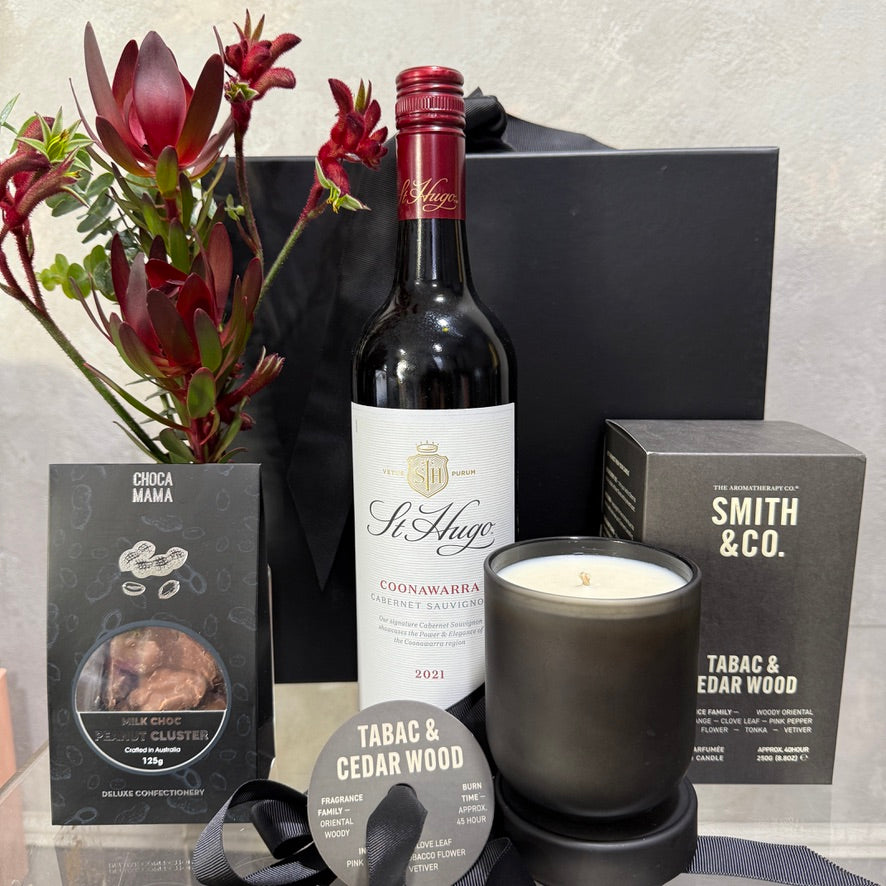 Smith & Co. Tabac and Cedar Wood Candle, with native flower bud vase, St Hugo Coonawarra Cabernet Sauvignon and Milk Choc Peanut Clusters