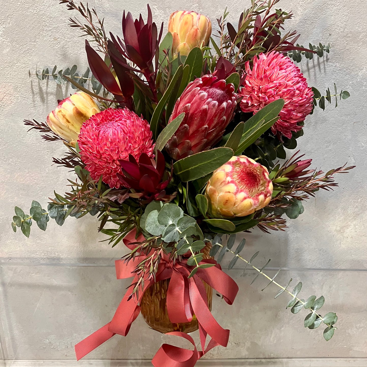 Petite Native Vase and Mum Arrangement in Amber Vase