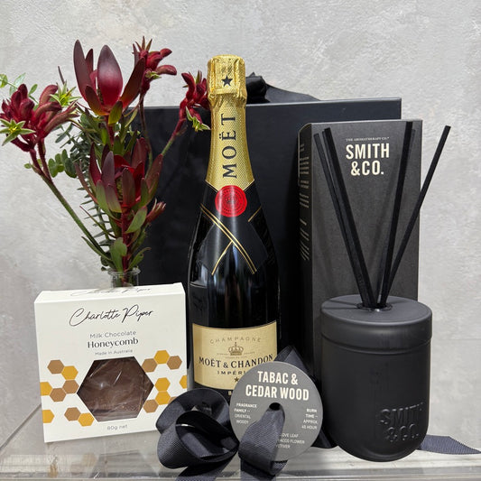 Smith & Co. Tabac and Cedar Wood, Bottle of Moet, small native bud vase and Charlotte Piper Milk Chocolate Honeycomb