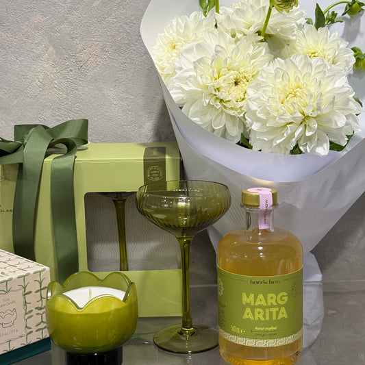 Margarita Mixer, Tulip Candle, Two Coupe Glasses and White Dahlias