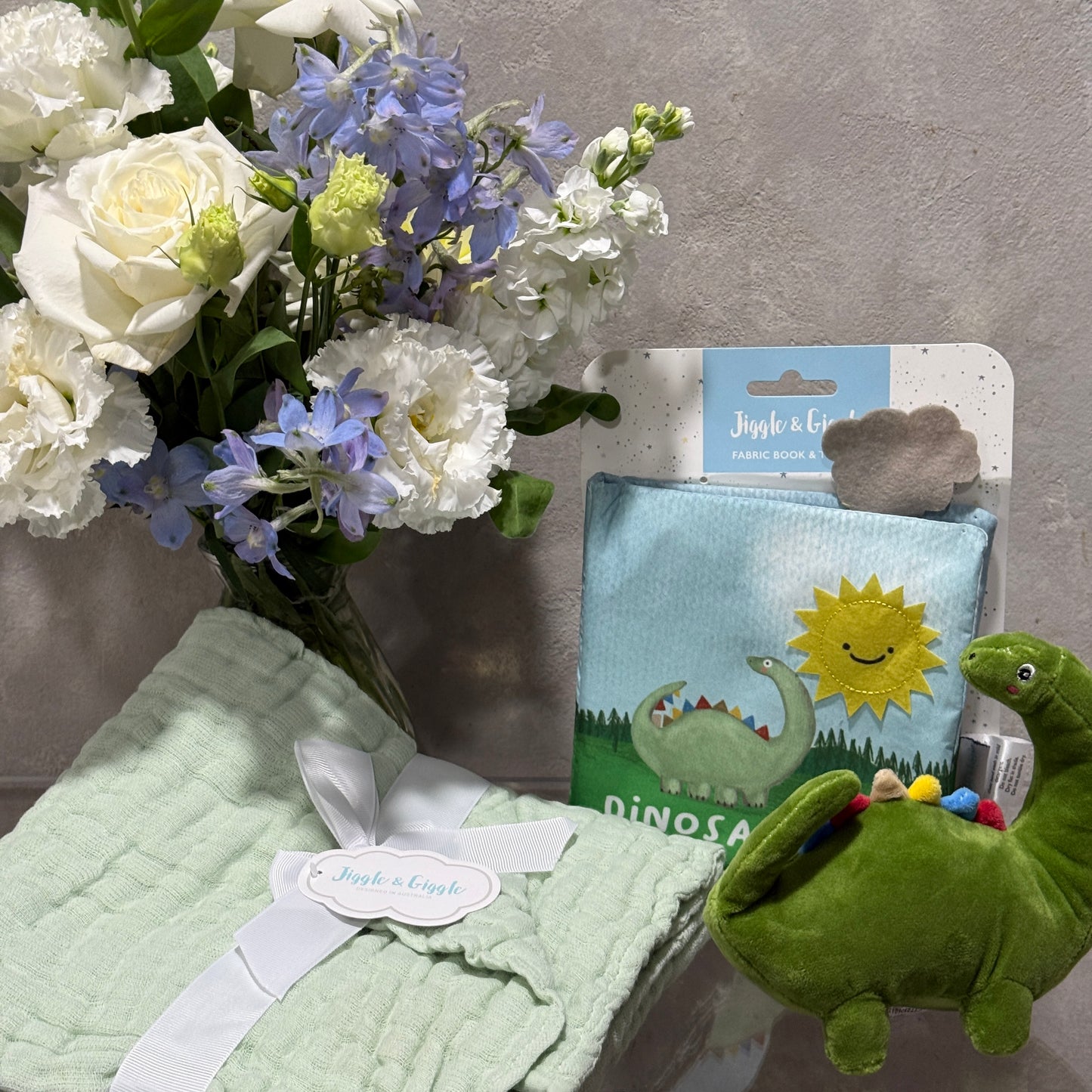 Dinosaur Fabric Book, Toy Dinosaur, Muslin Wrap and Vase of Blue and White Flowers