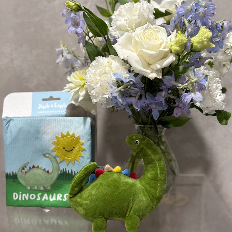Dinosaur Book and Vase of Blue and White Flowers